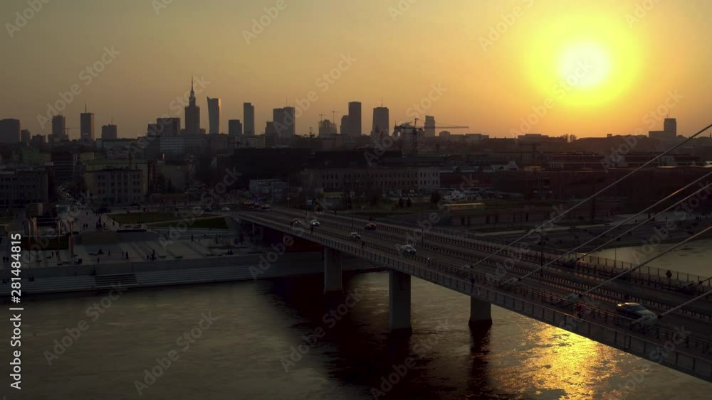 The drone flies above Vistula river at sunset. The drone flies above Vistula river at sunset.