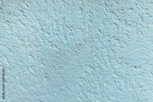 Light blue old painted wall background. Old texture.