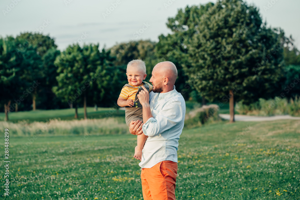 Dad carrying store baby
