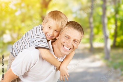 Happy father and son hugging on background © BillionPhotos.com