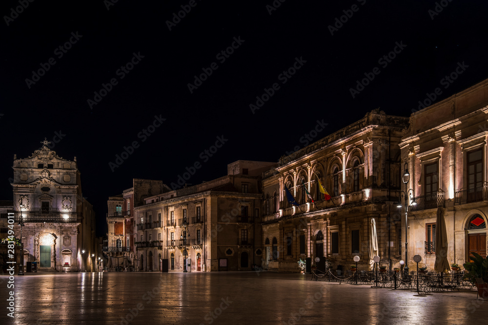 Night view of the main square of the island Ortigia near Syracuse city in Sicily, south Italy