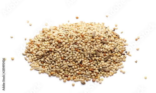 Mixed bird seeds  millet pile isolated on white background