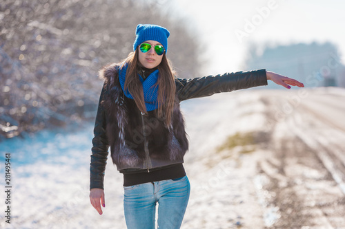 Tanya. Road hitch-hiking, fur jacket, half height! photo