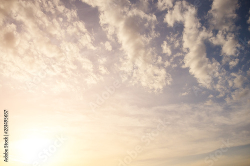 Thick fluffy sunset clouds. Background