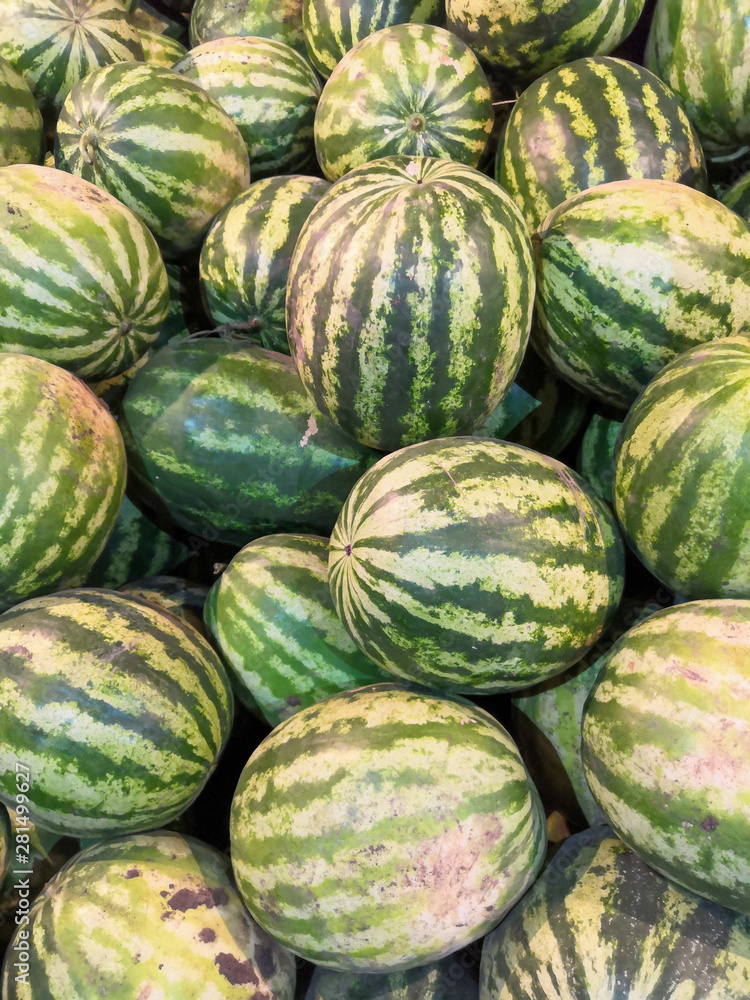 Fresh watermelon background in the fruit market.