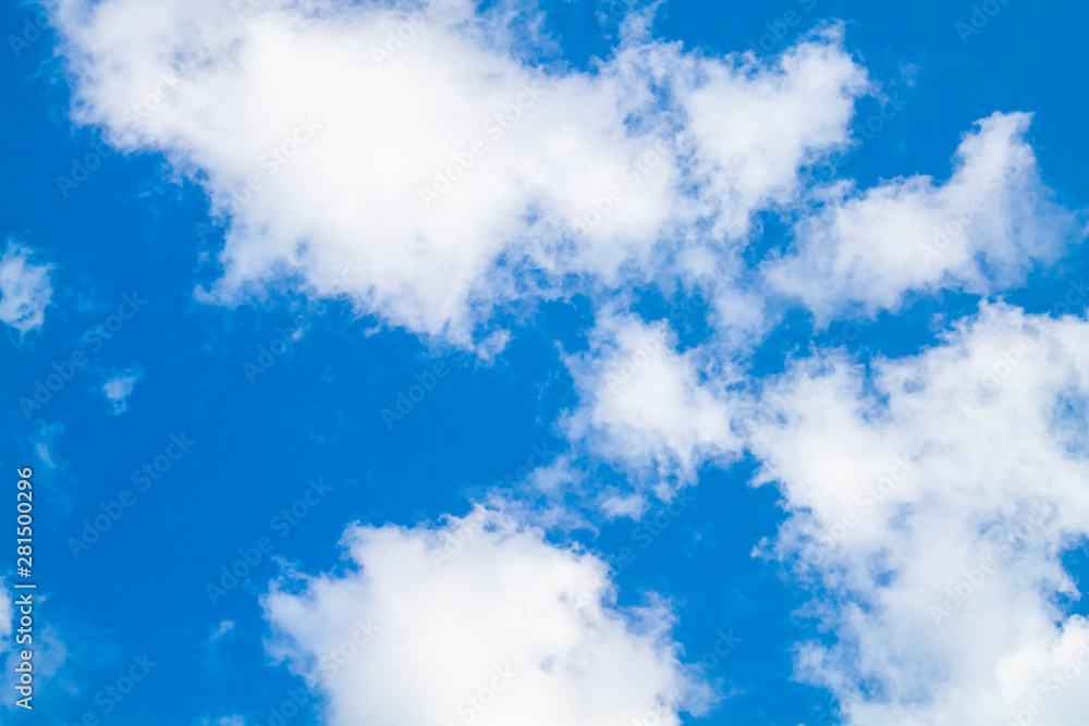 Obraz premium white clouds against the blue sky.