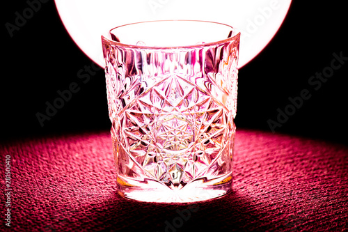 crystal glass in front of lamp