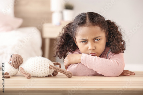 Sad little African-American...