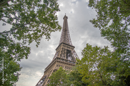 Eiffel Tower Paris surrounded by trees wide angle shot