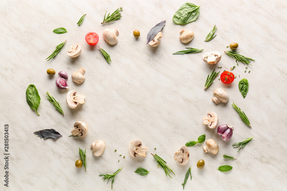 Frame made of fresh herbs with vegetables and mushrooms on light background Frame made of fresh herbs with vegetables and mushrooms on light background