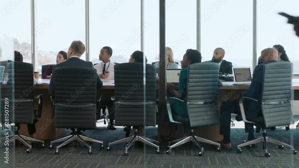 business woman team leader meeting with colleagues in boardroom discussing ideas planning strategy 