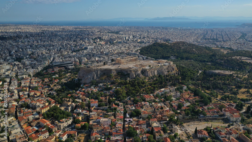Aerial drone photo of iconic Plaka and Monastiraki districts and iconic Acropolis hill with masterpiece of Western Ancient world the Parthenon, Athens historic centre, Attica, Greece