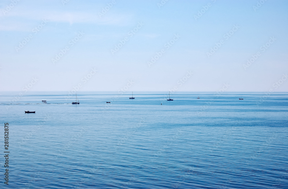 Fishing boats in the sea near the coast of the Bulgarian resort.