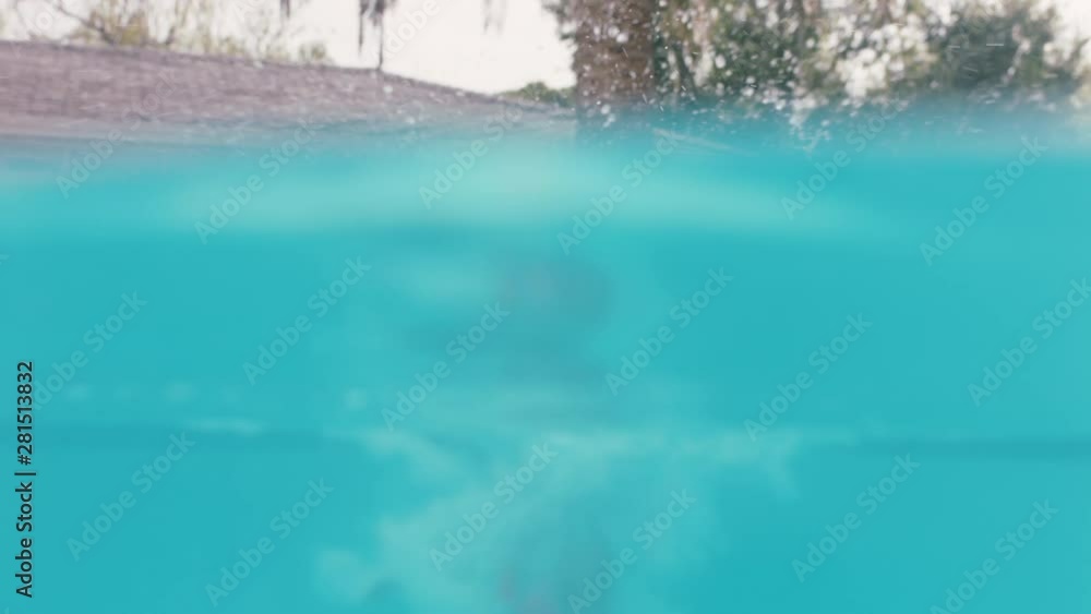 beautiful woman jumping in swimming pool splashing underwater having fun summer vacation enjoying summertime wearing pink bikini 4k footage beautiful woman jumping in swimming pool splashing underwater having fun summer vacation enjoying summertime wearing pink bikini 4k footage