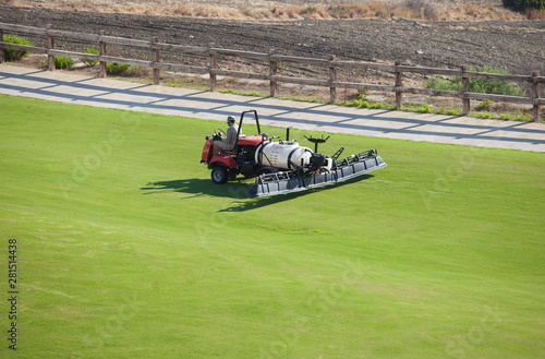 Sprayer machine performing maintenance at golf course. Shelf propelled vehicle © WH_Pics