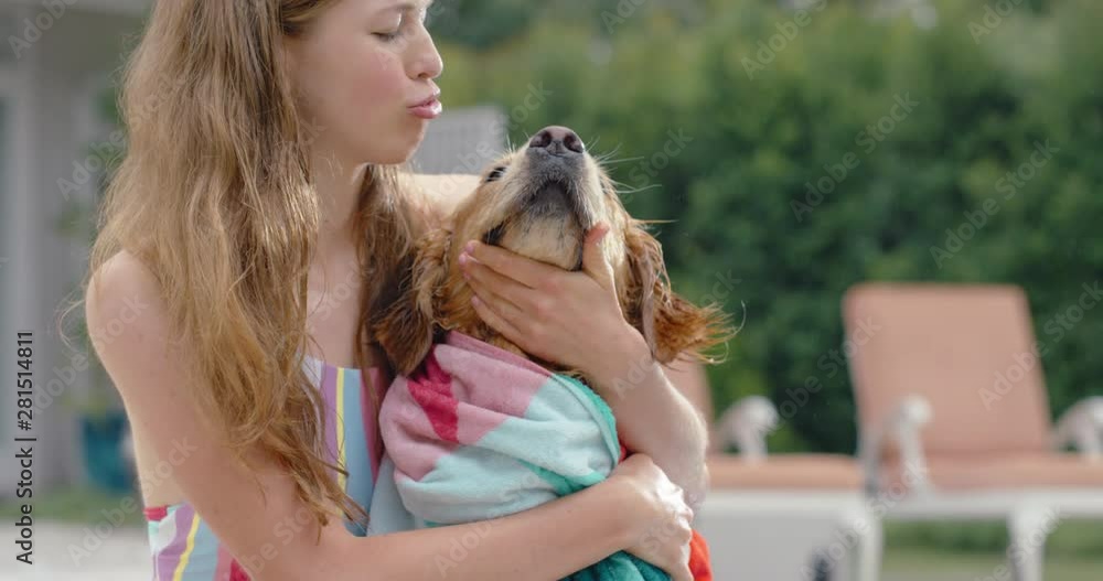 teenage girl drying wet dog with towel after swimming in pool enjoying summer vacation with golden retriever animal companion having fun afternoon together 4k teenage girl drying wet dog with towel after swimming in pool enjoying summer vacation with golden retriever animal companion having fun afternoon together 4k