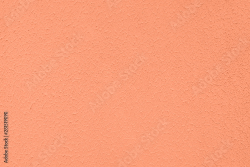 Light orange colored low contrast Concrete textured background with roughness and irregularities to your concept or product.