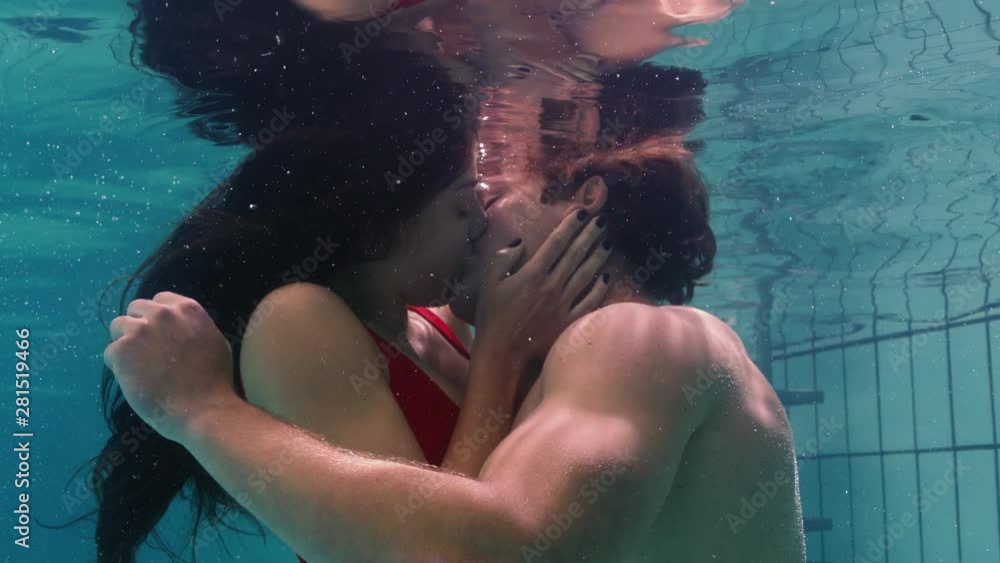 Lesbians Kissing In A Pool