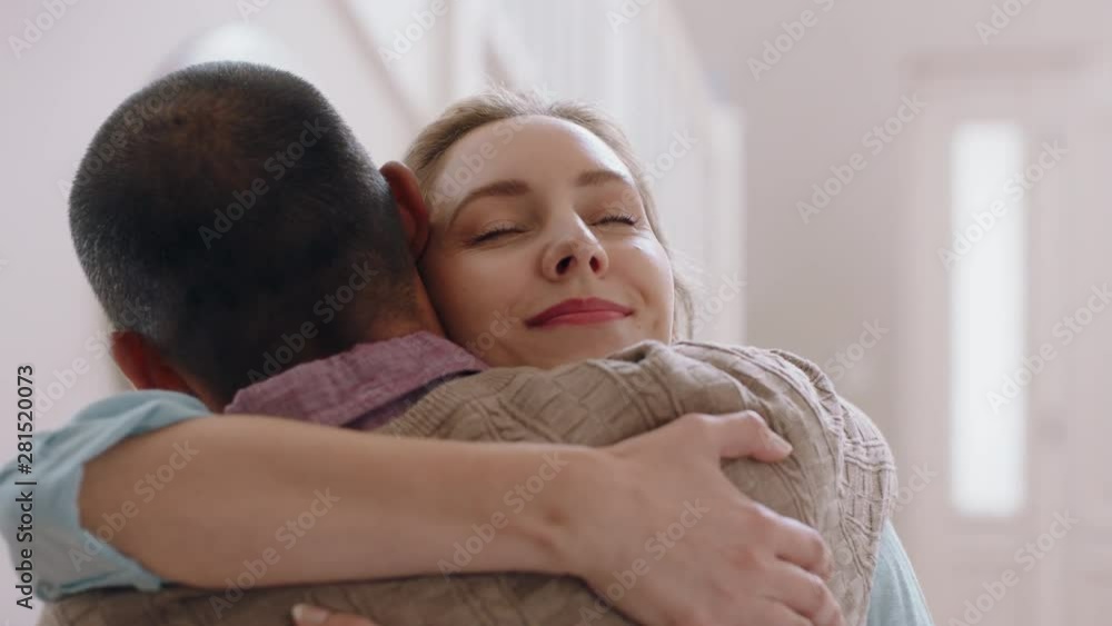 happy couple hugging woman embracing husband sharing good news enjoying romantic relationship at home 4k footage