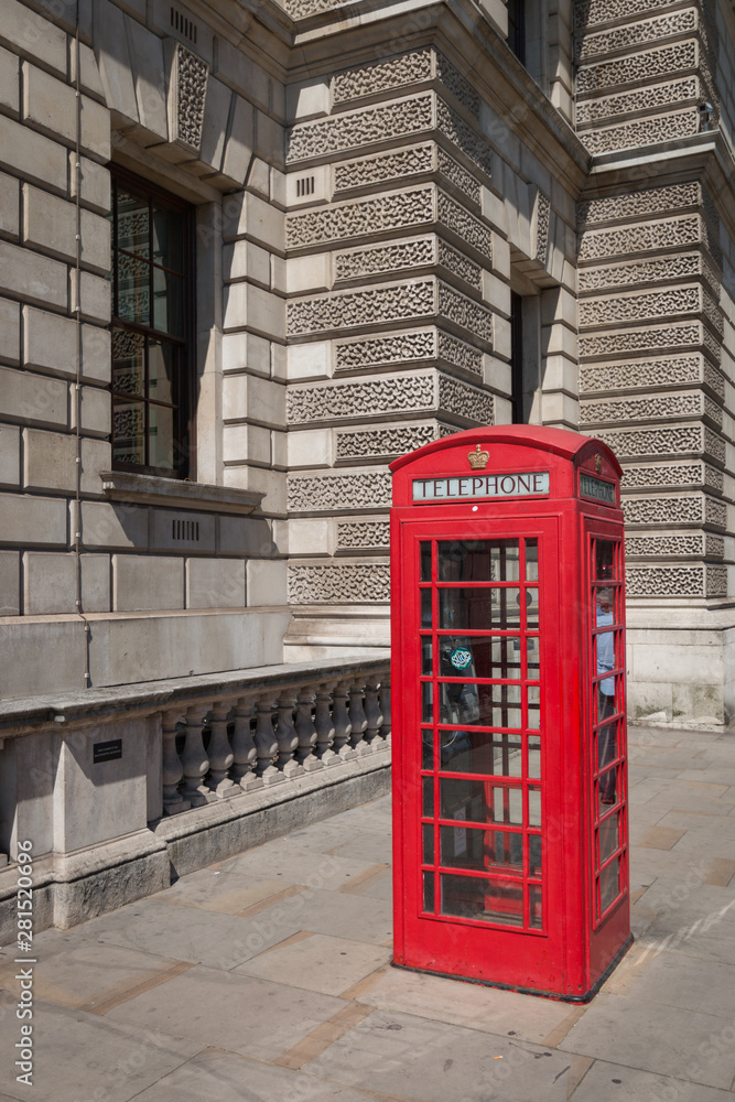 Classic red British telephone box in London Classic red British telephone box in London