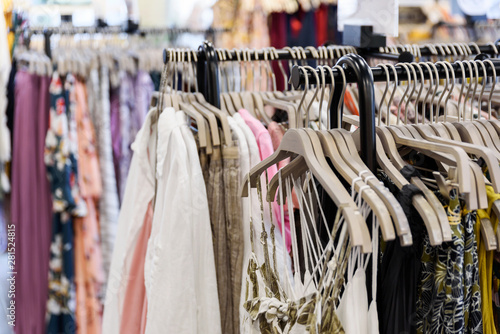 Apparel store clothes on hangers shopping sales concept