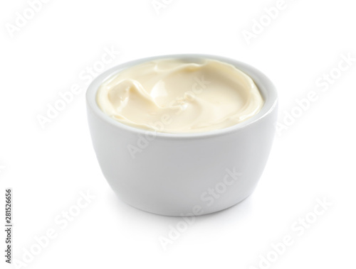 Delicious mayonnaise sauce in bowl on white background