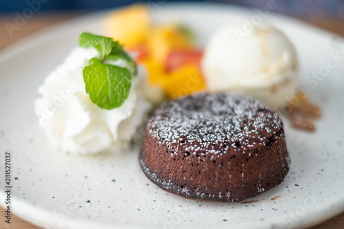 Chocolate Lava Cake with fresh fruits, icecream and whipcream.
