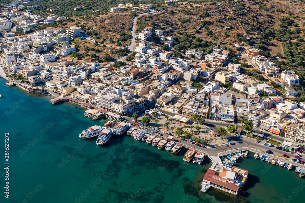 ELOUNDA, CRETE, GREECE - 13 JULY 2019: Aerial view of the up market town of Elounda on the greek island of Crete