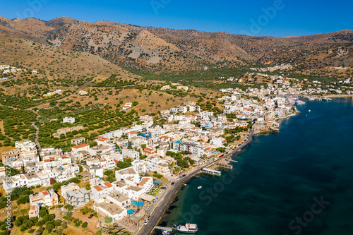 ELOUNDA, CRETE, GREECE - 13 JULY 2019: Aerial view of the up market town of Elounda on the greek island of Crete