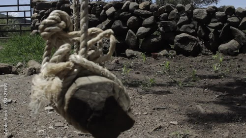 Columpio de cuerda y medera en rancho de Mexico  photo