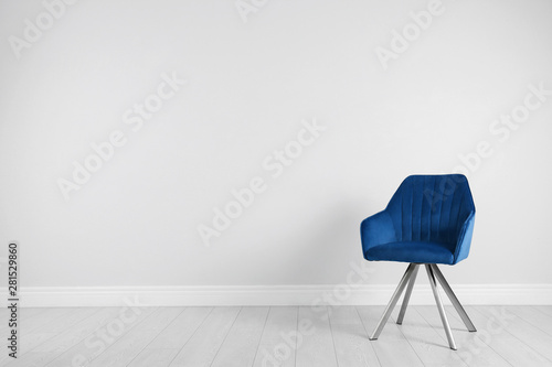 Blue modern chair for interior design on wooden floor at white wall