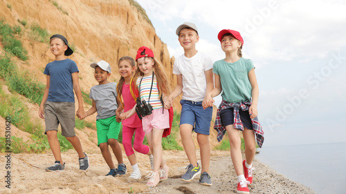 Cute little children outdoors on summer day. Camping trip