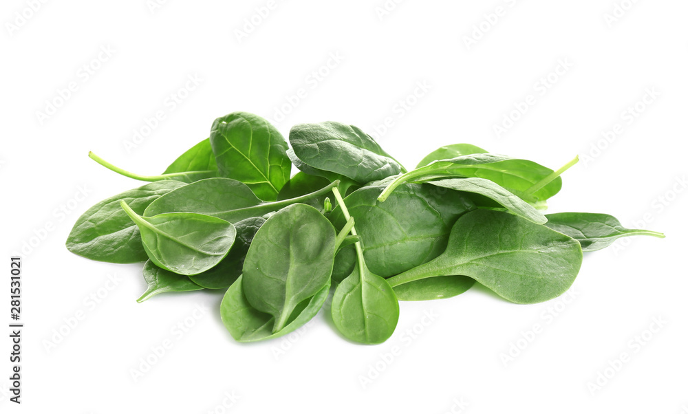 Pile of fresh green healthy baby spinach leaves on white background Pile of fresh green healthy baby spinach leaves on white background