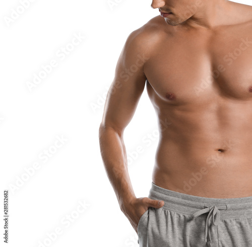 Young man with slim body on white background, closeup view