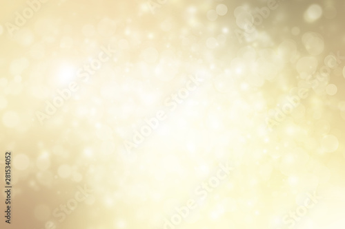 Golden sparkle blur abstract background. Bokeh Christmas blurred beautiful shiny Christmas lights