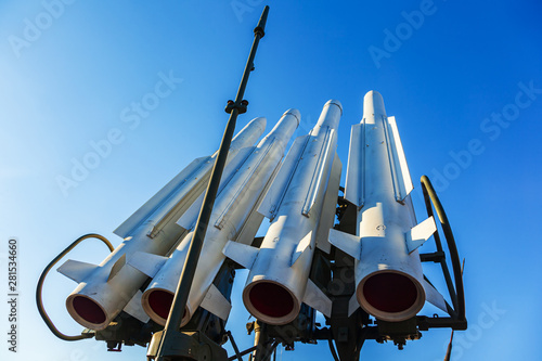 The Beech, SA-17 Grizzly is a ground-to-air self-propelled medium-range anti-aircraft missile system to combat maneuvering aerodynamic targets. Missiles of the air defense system on sky background. photo