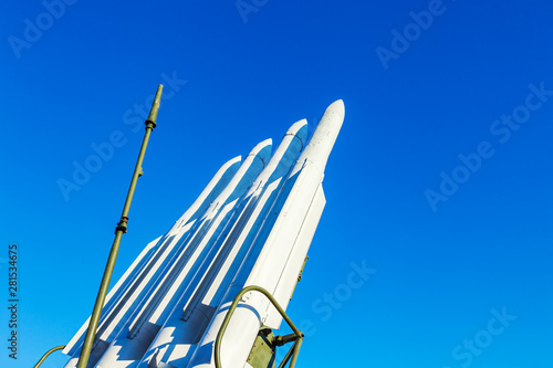 The Beech, SA-17 Grizzly is a ground-to-air self-propelled medium-range anti-aircraft missile system to combat maneuvering aerodynamic targets. Missiles of the air defense system on sky background. photo