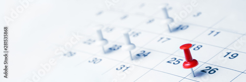 Tacks On Calendar Page/Business Concept photo