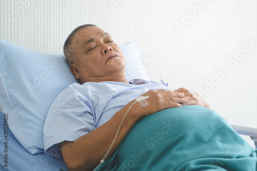 Patient lying on the bed and resting in hospital.