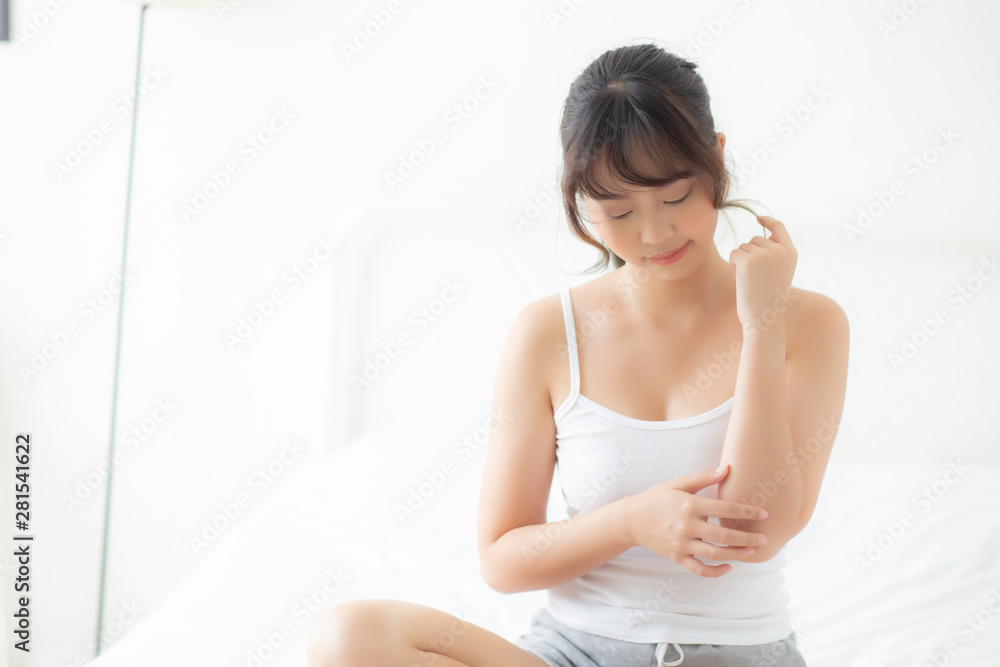 beautiful young asian woman applying skincare and moisturizer cream or treatment for scratch and itchy, beauty asia girl applying cream and lotion for dryness of skin care with cosmetic makeup. beautiful young asian woman applying skincare and moisturizer cream or treatment for scratch and itchy, beauty asia girl applying cream and lotion for dryness of skin care with cosmetic makeup.