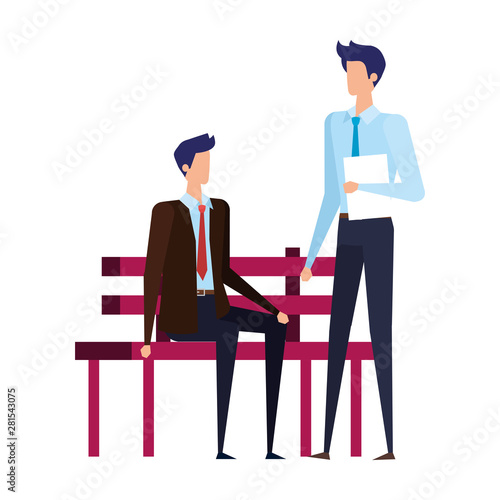 elegant businessmen seated in the park chair