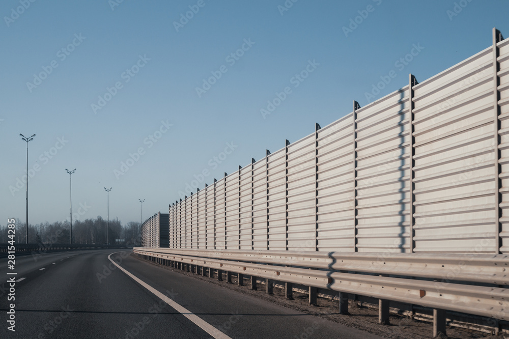 Wide highway. long roadway. road going into the distance