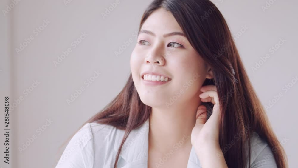 Close up beautiful of Asian business women sitting smiling and happiness Close up beautiful of Asian business women sitting smiling and happiness