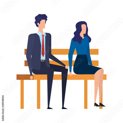 elegant business couple seated in the park chair
