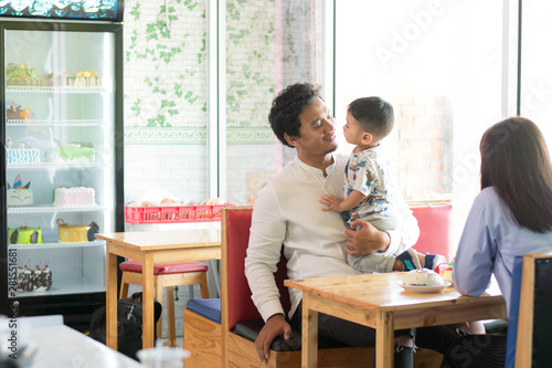 father and son at indoors bakery