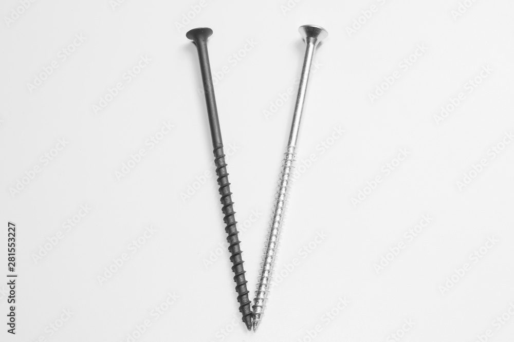 Long screws on a white background