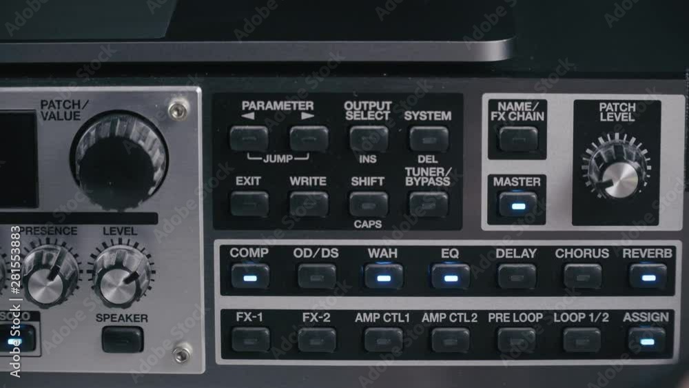 Musician tests the parameters of a preamp guitar multi effect, close up 4K Musician tests the parameters of a preamp guitar multi effect, close up 4K