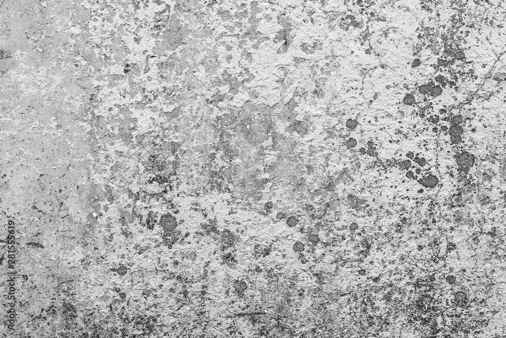 Texture of a concrete wall with cracks and scratches which can be used as a background Texture of a concrete wall with cracks and scratches which can be used as a background