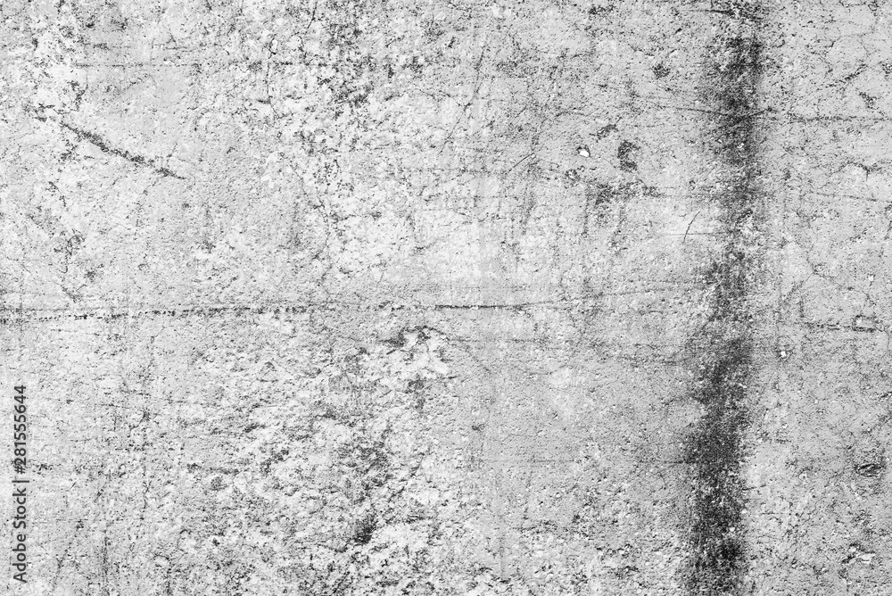 Texture of a concrete wall with cracks and scratches which can be used as a background Texture of a concrete wall with cracks and scratches which can be used as a background