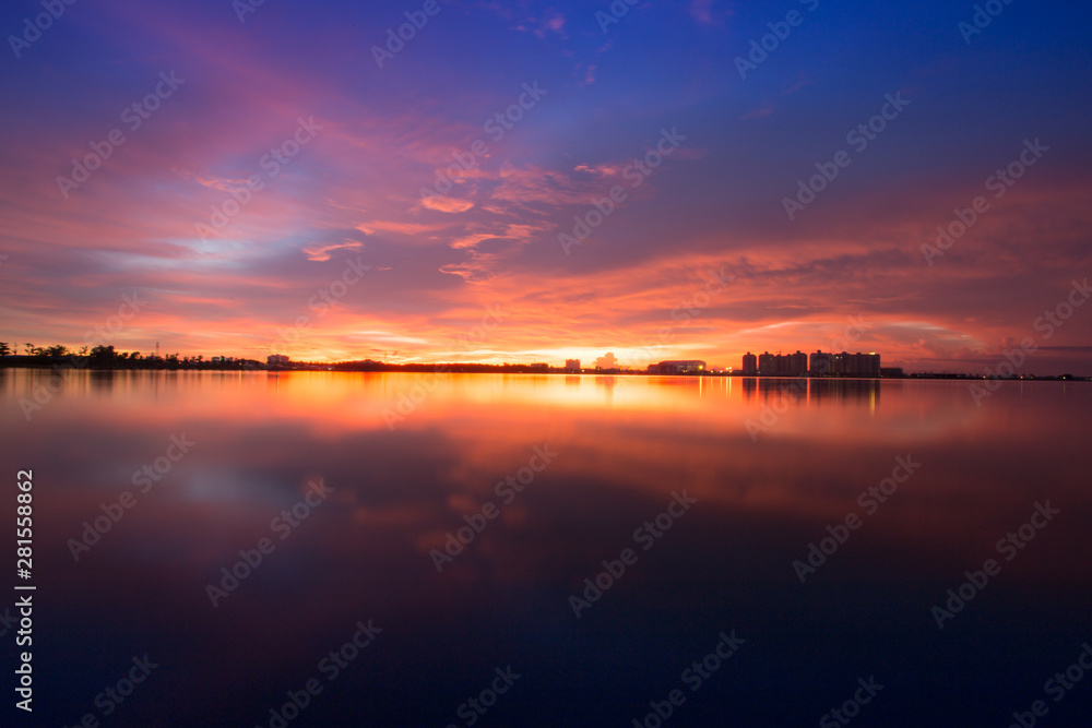 Beautiful sunset with reflection sky in water